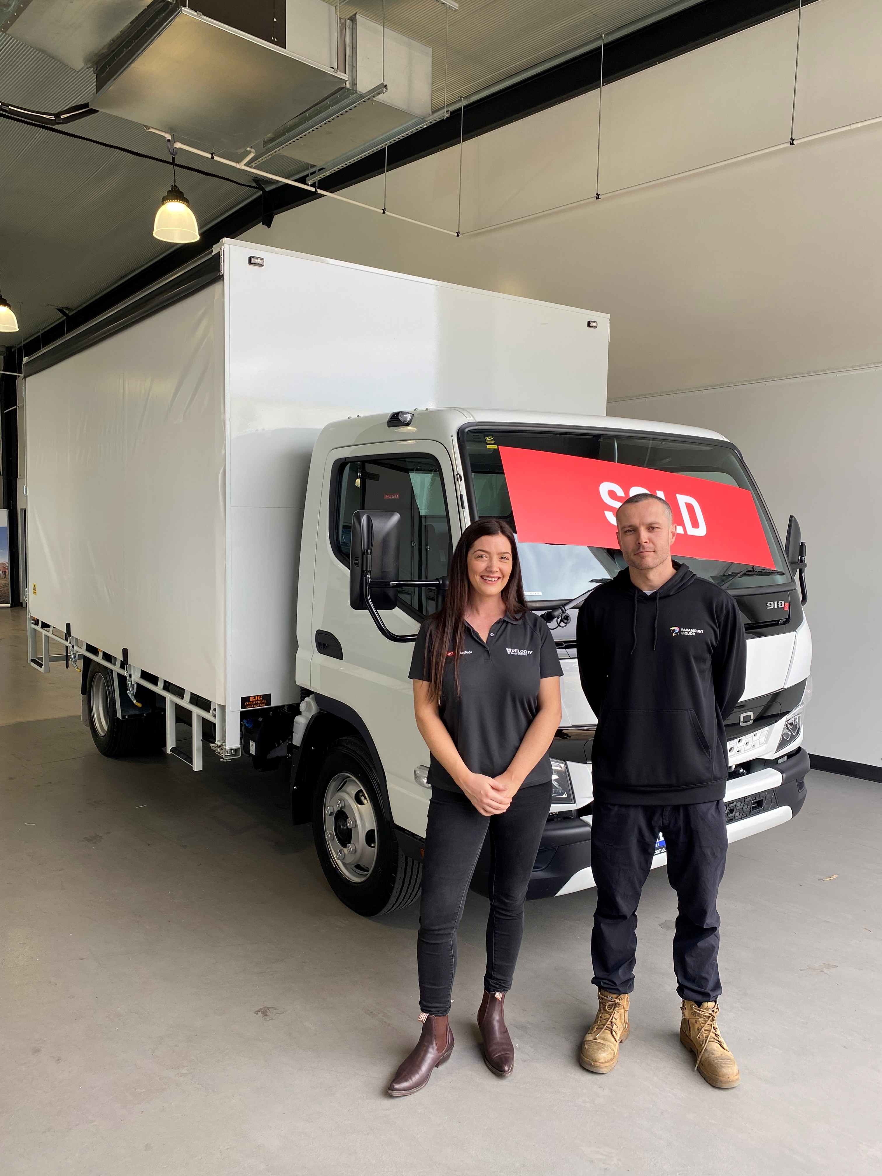 Fuso Canter 918 AMT fitted out with a custom tautliner body